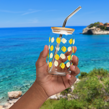 Load image into Gallery viewer, Glass with lemon design with the Mediterranean Sea in the background